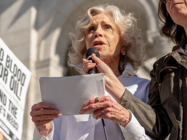 Actress Jane Fonda speaks during a protest against war in Iran at City Hall in Los Angeles