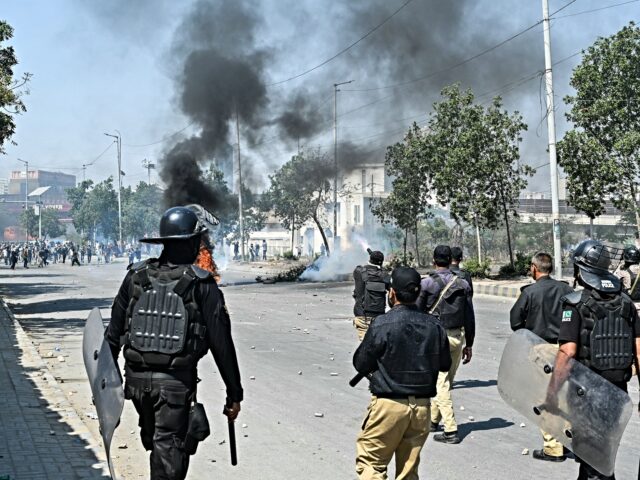 Police fire tear gas at Shiite Muslims as they stage protests in solidarity with Iran, out