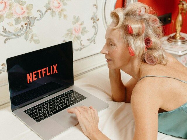 pexels-anastasia-shuraeva-6235469 A Woman Watching Netflix on a Laptop