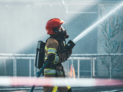 fireman holding hose
