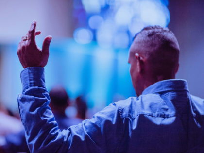 man in church worship service