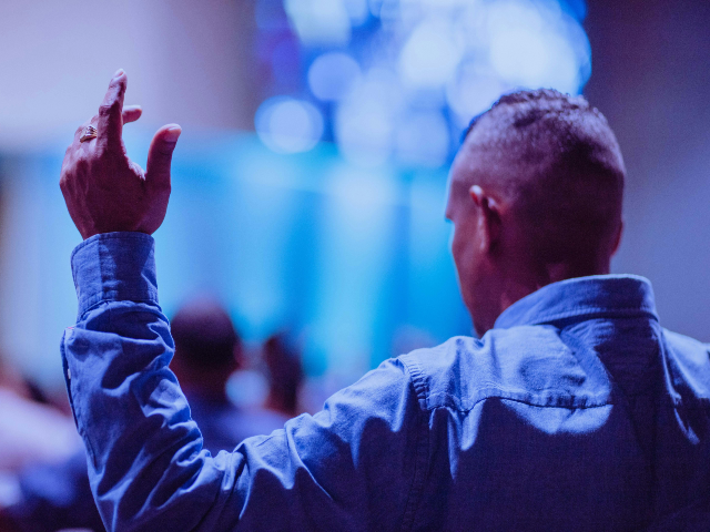 man in church worship service