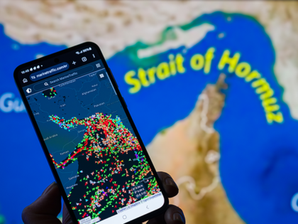 strait-of-hormuz-iran-getty A MarineTraffic map showing ship movements in the Strait of Hormuz is displayed on a smart
