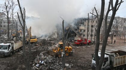 A ballistic missile strike destroyed a five-storey apartment block in Kharkiv, killing nin
