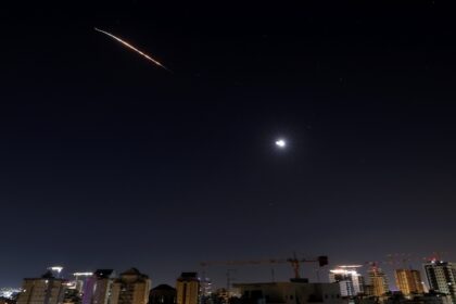 Rocket trails in the sky above the Israeli coastal city of Netanya amid a fresh barrage of