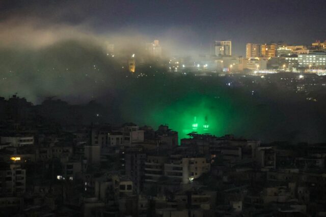 Smoke rises from the site of an Israeli air strike that targeted an area in Beirut's
