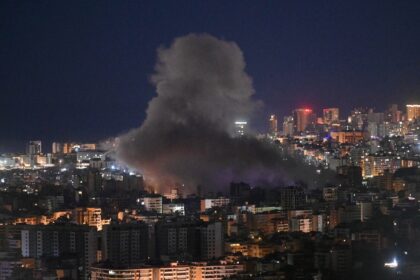 Smoke rises from the site of an Israeli airstrike that targeted an area in Beirut's s