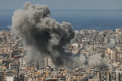 Smoke rises from the site of an Israeli airstrike that targeted an area in Beirut's s