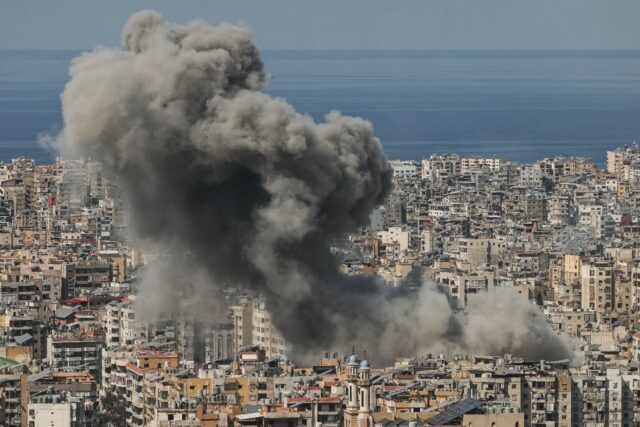 Smoke rises from the site of an Israeli airstrike that targeted an area in Beirut's s
