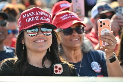 Supporters in Corpus Christi, Texas take pictures at a recent rally by US President Donald