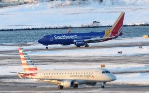 Air traffic snarled due to winter weather, government shutdown