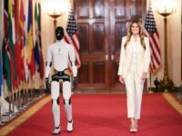 Fashion Notes: Melania Trump Struts Alongside Robot in Dolce & Gabbana