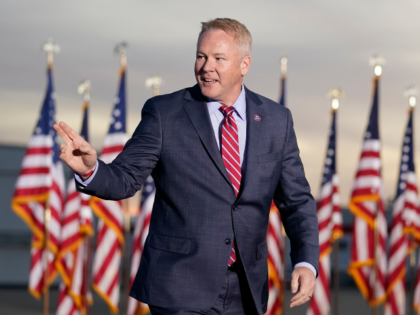Rep. Warren Davidson, R-Ohio, arrives to speak before former President Donald Trump at a r