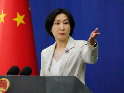 Chinese Foreign Ministry spokesperson Mao Ning gestures during a daily briefing at the Min