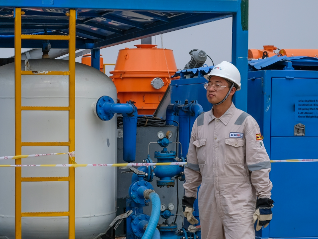 FILE - A Chinese worker from China Oilfield Services Limited (COSL), a contractor for Chin