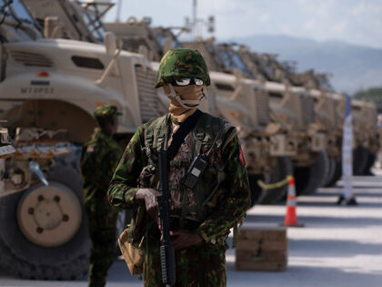 Title: Haiti US Aid Image ID: 24205081435132 Article: A Kenyan police officer part of a UN