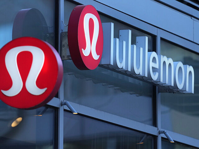 Title: Lululemon Image ID: 24348704968671 Article: Lululemon signs are displayed outside a