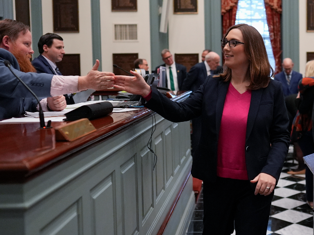 U.S.-Rep.-elect Sarah McBride, D-Del., celebrates with Assistant Secretary of the Senate D