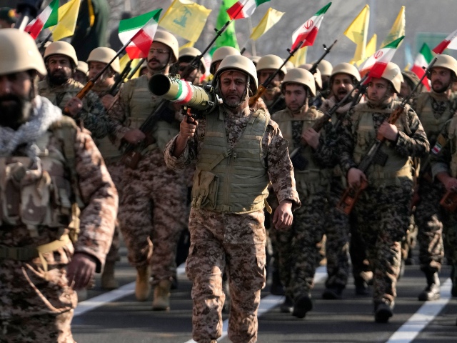 Members of the Iranian Basij paramilitary force march during the force parade in Tehran, I