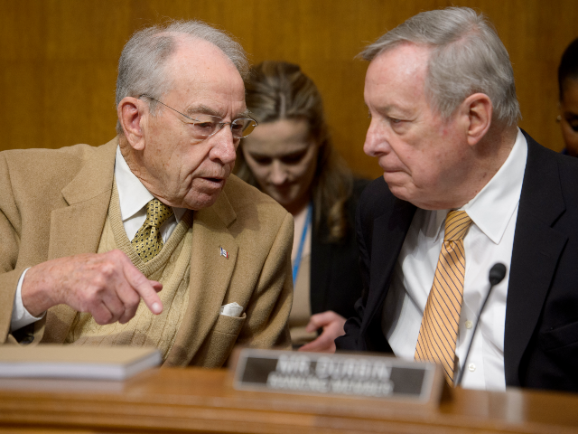 Committee Chair Sen. Chuck Grassley, R-Iowa, left, talks with Ranking Member Sen. Dick Dur