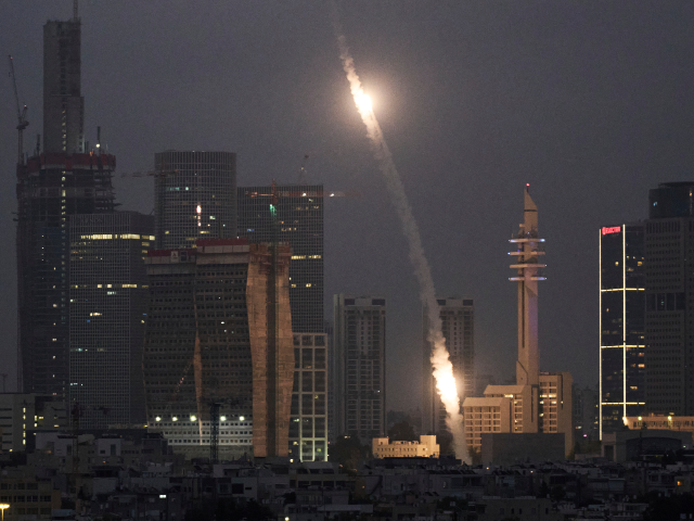 Israeli Iron Dome air defense system fires to intercept projectiles over Tel Aviv, Saturda