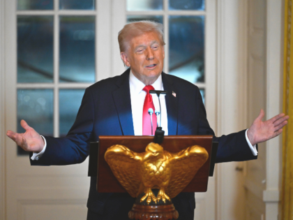 President Donald Trump addresses a dinner for donors who have contributed to build the new