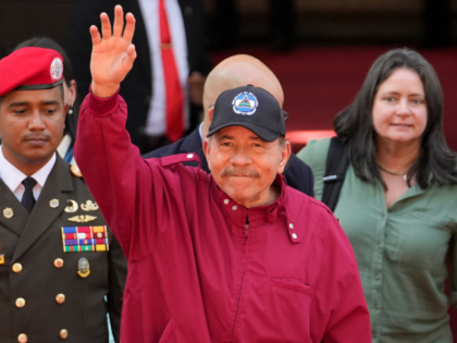 FILE - Nicaragua's President Daniel Ortega waves after attending the swearing-in cere