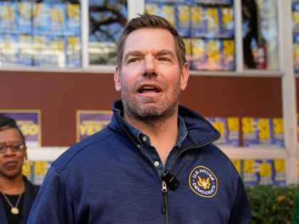 FILE - Rep. Eric Swalwell, D-Calif., speaks to reporters after a campaign event on Proposi