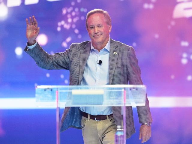 FILE - Texas Attorney General Ken Paxton takes the stage during Turning Point USA's A