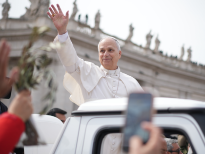 Pope Leo XIV leaves after presiding over Mass in St. Peter's Square at the Vatican on