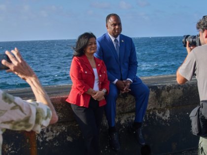 U.S. lawmakers Pramila Jayapal, D-Wash., center left, and Jonathan Jackson, D-Ill., pose f