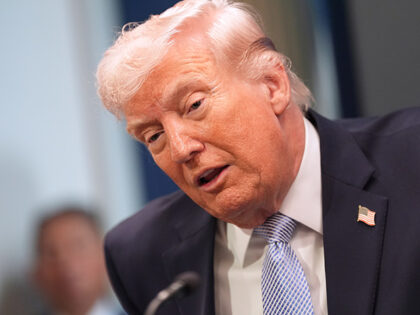 Title: Trump Image ID: 26096663516441 Article: President Donald Trump speaks with reporter