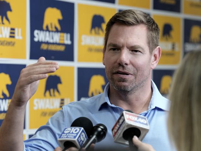 California gubernatorial candidate, Rep. Eric Swalwell, D-CA, talks with reporters after h