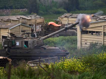 Israeli military mobile artillery unit fires towards southern Lebanon from northern Israel