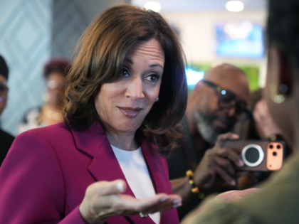 AP26105798399703 Former Vice President Kamala Harris speaks with a girl at Crave restaurant ahead of a Sout