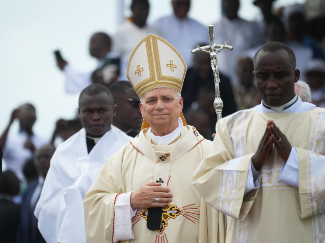 Pope Leo XIV arrives in procession to celebrate Mass at the Japoma Stadium, in Douala, Cam