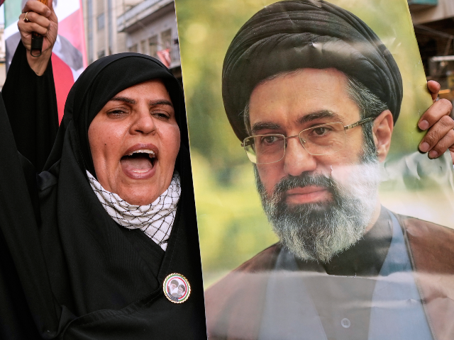 An Iraqi woman holds a portrait of Iran's Supreme Leader Ayatollah Mojtaba Khamenei,