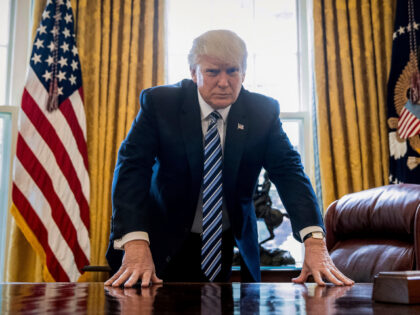 FILE - In this Friday, April 21, 2017, file photo, President Donald Trump poses for a port
