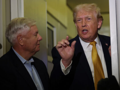 U.S. President Donald Trump (R) and U.S. Sen. Lindsey Graham (R-SC) speak to the media abo