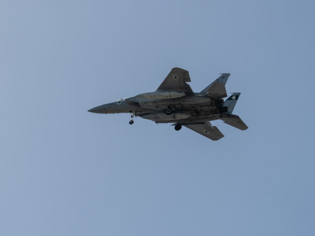 An Israeli F-15 fighter jet flies on March 20, 2026 in Rehovot, Israel. Israel is fighting