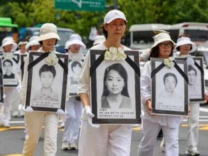 Members of Falun Dafa, alternate name of Falun Gong, parade to protest against what they s