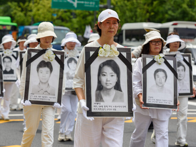Members of Falun Dafa, alternate name of Falun Gong, parade to protest against what they s