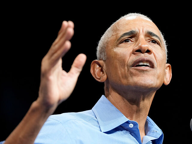 Former President Barack Obama, gestures during a rally for Virginia Democratic gubernatori