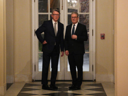 WASHINGTON, DC - FEBRUARY 26: British Prime Minister Keir Starmer (R) talks with Britain&#