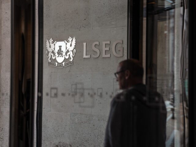 LONDON, ENGLAND - APRIL 25: A person passes a London Stock exchange Group logo at the Lond