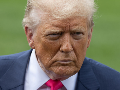 US President Donald Trump speaks with members of the media before boarding Marine One on t