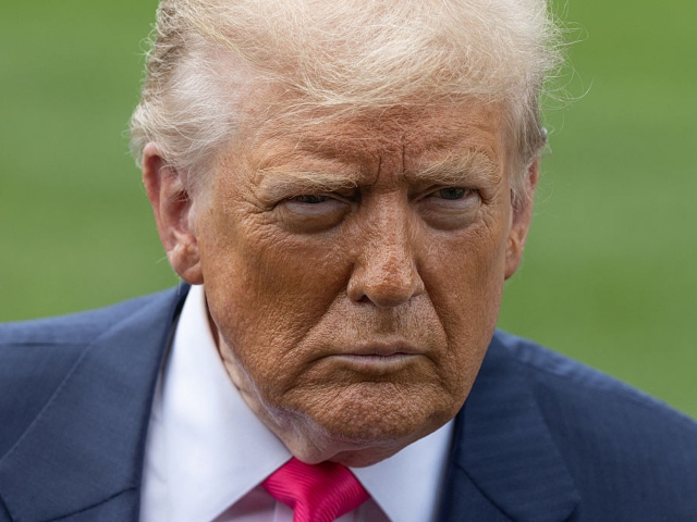 US President Donald Trump speaks with members of the media before boarding Marine One on t