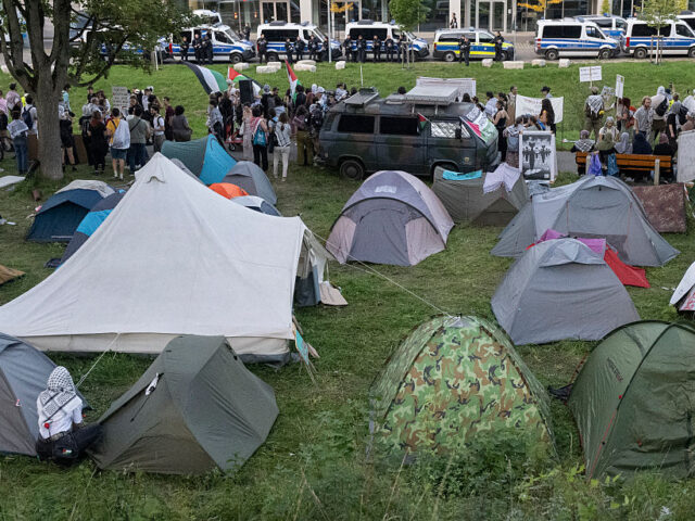 20 September 2025, Baden-Württemberg, Ulm: Tents are set up on a protest camp in front of