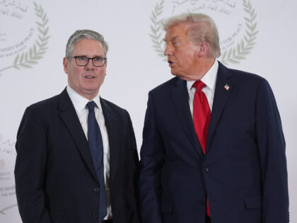 SHARM EL-SHEIKH, EGYPT - OCTOBER 13: President Donald Trump greets Britain's Prime Mi