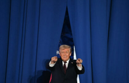 US President Donald Trump steps on stage to speak at a political rally in Rocky Mount, Nor